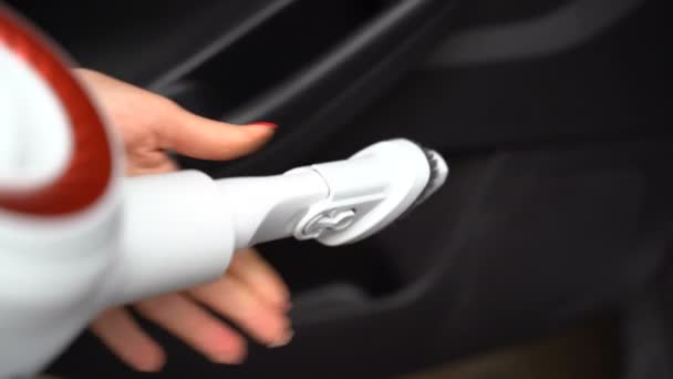 Girl is vacuuming a car — Stock Video