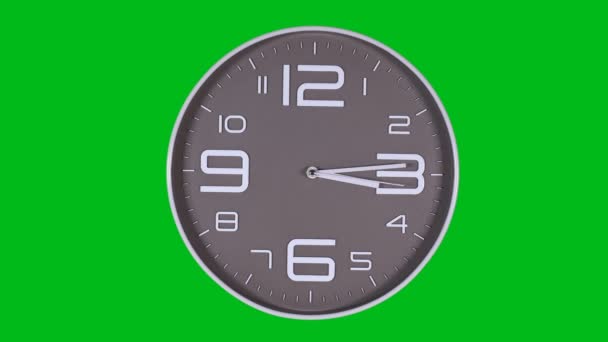 Orologio da parete su sfondo verde. Giri temporali — Video Stock