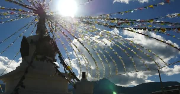 Buddhist White Stupa Flying Prayer Flags Blue Sky Background Shangrila — Stock Video