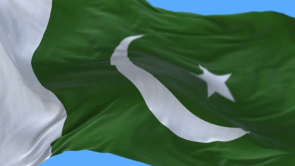 4k nahtlose Nahaufnahme der pakistanischen Flagge, die langsam im Wind weht. — Stockvideo