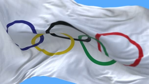 4k nahtlose Nahaufnahme der olympischen Flagge, die langsam im Wind weht. — Stockvideo