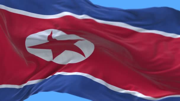 4k naadloze close-up van Noord-Korea vlag langzaam zwaaien in de wind. alfakanaal. — Stockvideo