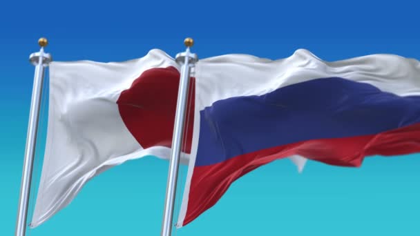4k senza soluzione di continuità Russia e Giappone Bandiere con sfondo cielo blu, RUS JP . — Video Stock