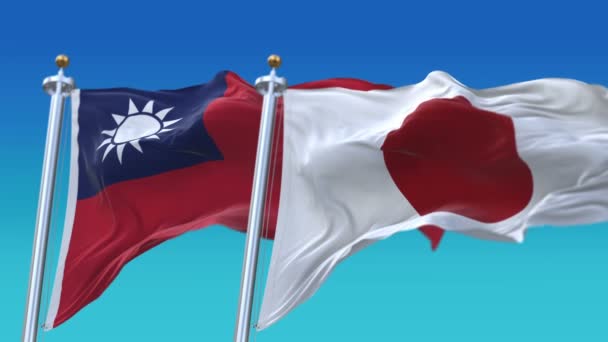 4k naadloze Taiwan en Japan vlaggen met blauwe hemel achtergrond, TWN JP. — Stockvideo