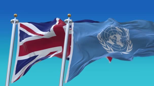 4k zökkenőmentes Egyesült Nemzetek és az Egyesült Királyság-Britannia Anglia zászlók kék s — Stock videók