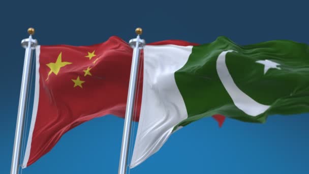 4K χωρίς ραφές Πακιστάν και Κίνας σημαίες με μπλε ουρανό φόντο, Pak PK CHN CN. — Αρχείο Βίντεο
