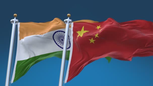 4k naadloze India en China vlaggen met blauwe hemel achtergrond, ind in CHN CN. — Stockvideo