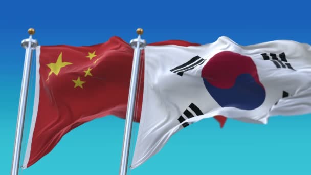 4k Seamless Corea del Sud e Cina Bandiere con sfondo cielo blu, ROK CHN CN . — Video Stock