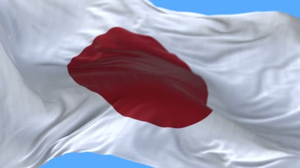 4k naadloze close-up van Japan vlag langzaam zwaaien in de wind. alfakanaal opgenomen. — Stockvideo