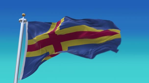 4k Aland Islands Národní vlajka vrásky bezproblémový vítr na modré obloze pozadí. — Stock video