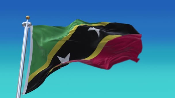 4k Saint Kitts és Nevis Nemzeti zászló ráncok zökkenőmentes szél az égen háttér — Stock videók