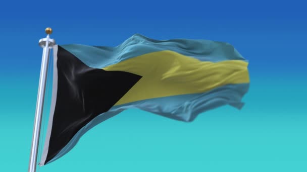 4k Bahamas Bandera nacional arrugas lazo viento sin costuras en el fondo del cielo azul. — Vídeo de stock