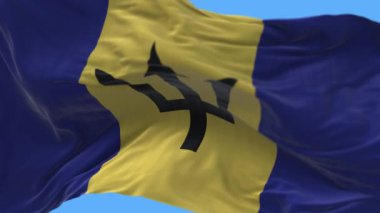 4k Barbados Ulusal bayrak kırışıklıkları mavi gökyüzü arka planında pürüzsüz rüzgar döngüsü.