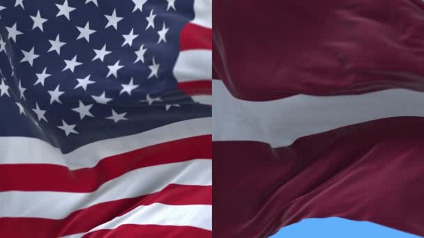 4k Estados Unidos de América EE.UU. y Letonia Bandera nacional sin costuras . — Vídeo de stock