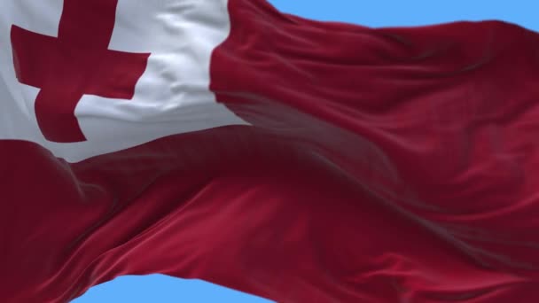 4k Tonga Nationale vlag rimpels wuivende wind hemel naadloze lus achtergrond. — Stockvideo