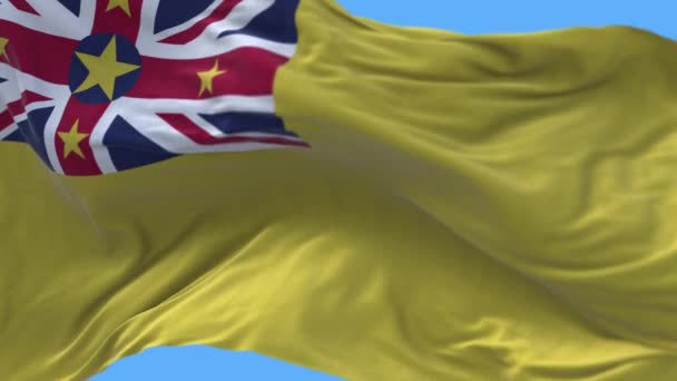 4k Niue Nationalflagge Falten wehen Wind Himmel nahtlose Schleife Hintergrund. — Stockvideo