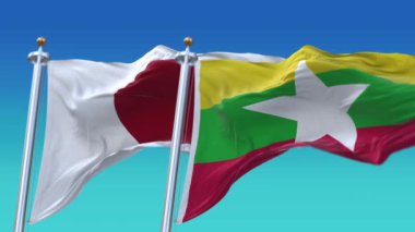 4k Kusursuz Japonya ve Myanmar Bayrakları mavi gökyüzü arkaplanlı, JP.