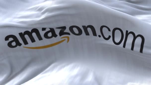 4k Amazon.com σημαία της εταιρείας ρυτίδες αέρα αργή κίνηση αδιάλειπτη βρόχο φόντο. — Αρχείο Βίντεο