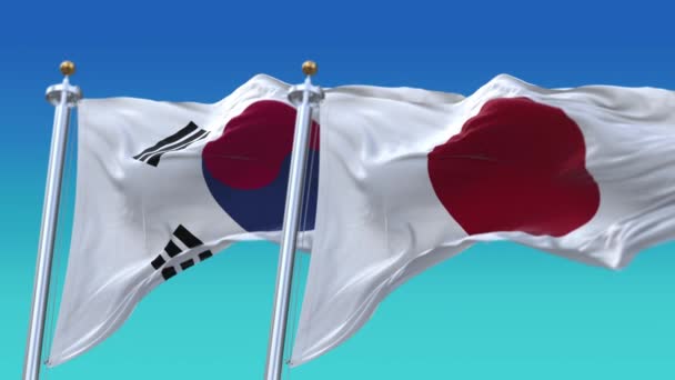 4k Płynna Japonia i Republika Korei Flagi z niebieskim tle nieba, JP. — Wideo stockowe