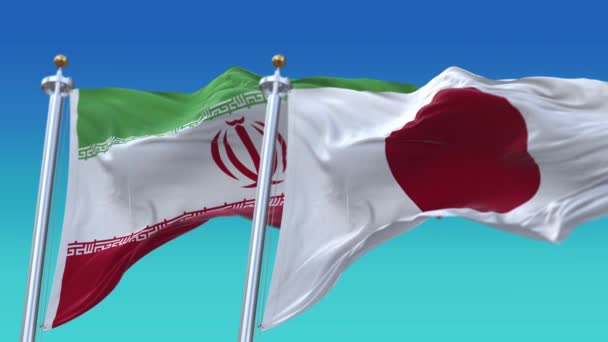 4k Płynna Japonia i Iran Flagi z niebieskim tle nieba, JP. — Wideo stockowe