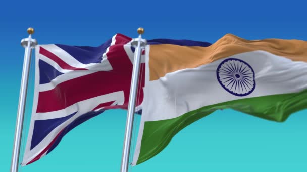 4k Kusursuz Hindistan ve İngiltere İngiltere Mavi gökyüzü gerisiyle Birleşik Krallık Bayrakları — Stok video