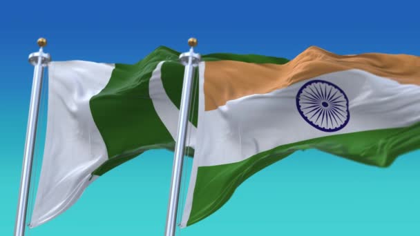 4k Безшовные Индии и Пакистана Флаги с голубым небом фоне, JP, IND. — стоковое видео