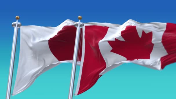 4k Płynna Japonia i Kanada Flagi z niebieskim tle nieba, JP. — Wideo stockowe