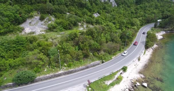 Quadcopter Flying Narrow Asphalt Road Running Sea Shore Can See — Stock Video