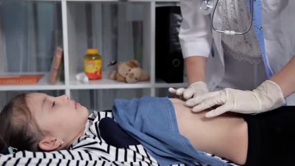 Pediatrician Doing Abdominal Examination Hands Doctor Checking Stomach Sick Girl — Stock Video