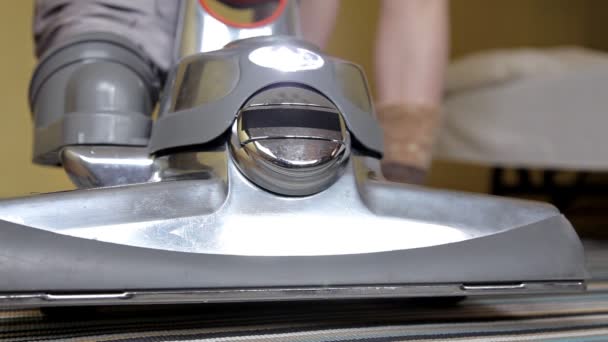 Vacuum cleaner point of view rolling back and forth on a parquet floor — Stock Video