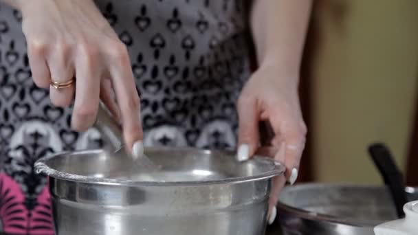 Young girl mixing flour with a whisk while cooking the dough. Pie, baking, dishes — Stock Video