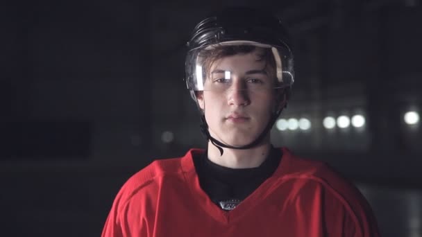 Handsome Hockey Player Smiling At Camera On Dark Arena Close Up Portrait Of Defender Or Forward Canadian Player Video By C Jinlipu Stock Footage Handsome Hockey Player Smiling At Camera On Dark Arena Close Up Portrait Of Defender Or Forward Canadian Player Video By C Jinlipu Stock Footage