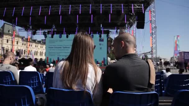 A man and a woman are at a seminar, training and are looking at the screen — Stock Video