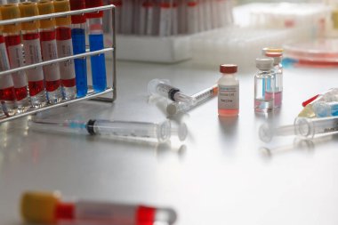 Research and development concept, Laboratory scientist researching covid-19(corona virus) vaccine at laboratory.