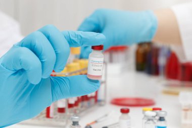 Research and development concept, Laboratory scientist researching covid-19(corona virus) vaccine at laboratory.