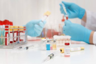 Research and development concept, Laboratory scientist researching covid-19(corona virus) vaccine at laboratory.