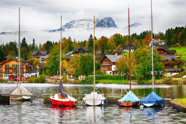 Yacht dock on the lake. Misty morning on the lake Grundlsee Location: resort Grundlsee, Liezen District of Styria, Austria, Alps. Europe.