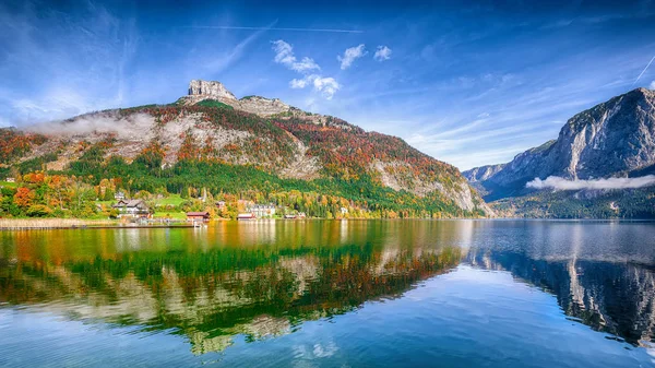 Sunny morning on the lake Altausseer See. Sunny autumn scene in the morning. Location: resort Altausseer see, Liezen District of Styria, Austria, Alps. Europe.