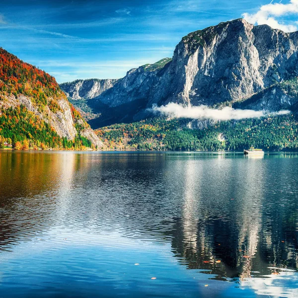 Sunny morning on the lake Altausseer See. Sunny autumn scene in the morning. Location: resort Altausseer see, Liezen District of Styria, Austria, Alps. Europe.