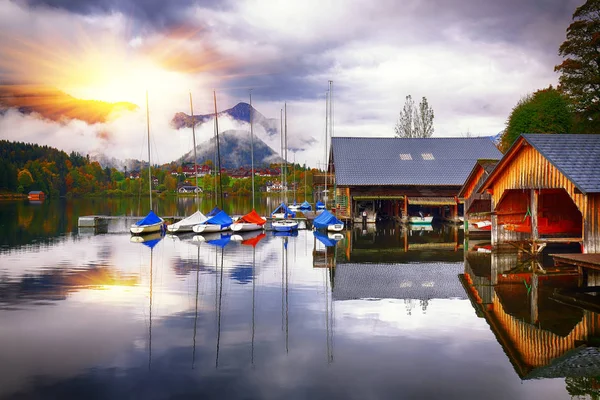 Yacht dock on the lake. Misty morning on the lake Grundlsee Location: resort Grundlsee, Liezen District of Styria, Austria, Alps. Europe.