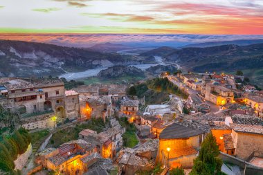 Sunrise over old famous medieval village Stilo in Calabria clipart
