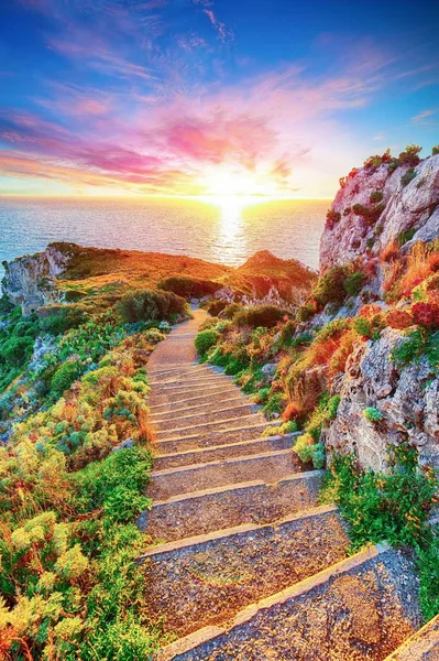 Dramatic spring sunset on the the cape Milazzo panorama of natur