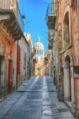 Walking around the old streets of  baroque town Ragusa Ibla in S clipart