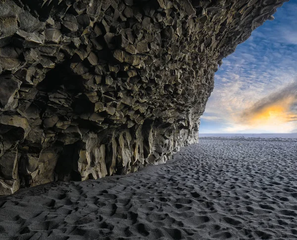 Amazing landscape with basalt rock formations  on Black beach Re