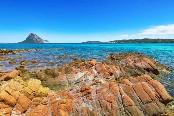 Fantastic azure water with rocks near beach Porto Taverna. — Stock Photo, Image