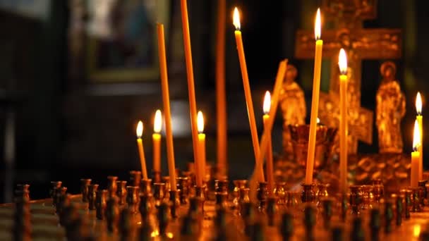 Large gold candlestick with burning candles closeup in the form of a table — Stock Video