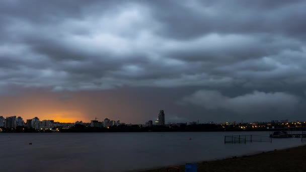 Thunderbolt in the dramatic dark sky over the city of timelapse — Stock Video