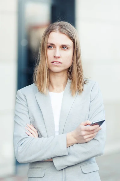 Beautiful Young Businesswoman Using Smartphone — Stock Photo, Image