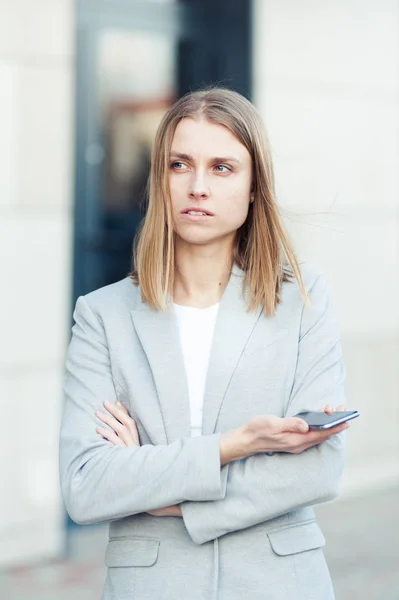 Beautiful Young Businesswoman Using Smartphone — Stock Photo, Image