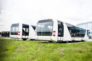 buses   near the airport building 